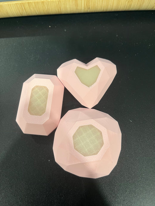 Pink 3D-printed gem trio with UV-reactive centers